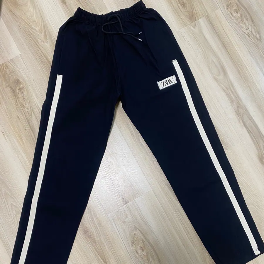 شلوار اسلش بغل‌نوار کنفی سایز بزرگ — عکس واقعی ۶
