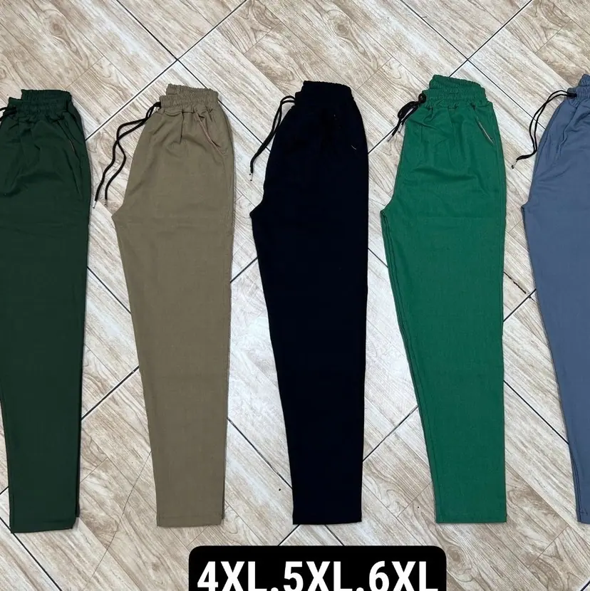 شلوار اسلش کتان کشی ساده سایز بزرگ 4XL تا 6XL — عکس واقعی ۲